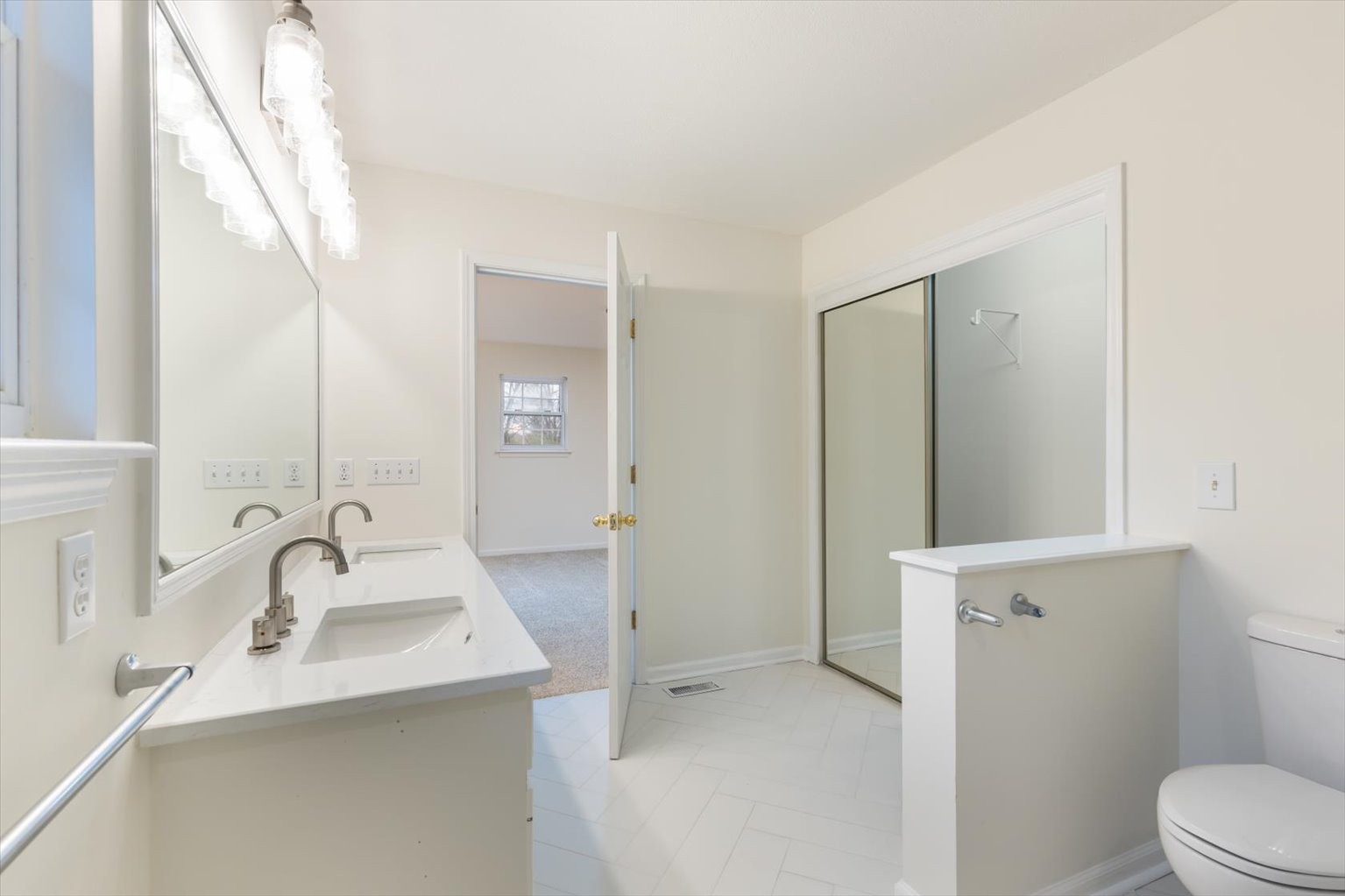 1775 Nelson Road Goodlettsville, TN 37072 - Photo 25 of 45 a bathroom with a sink and mirror with toilet