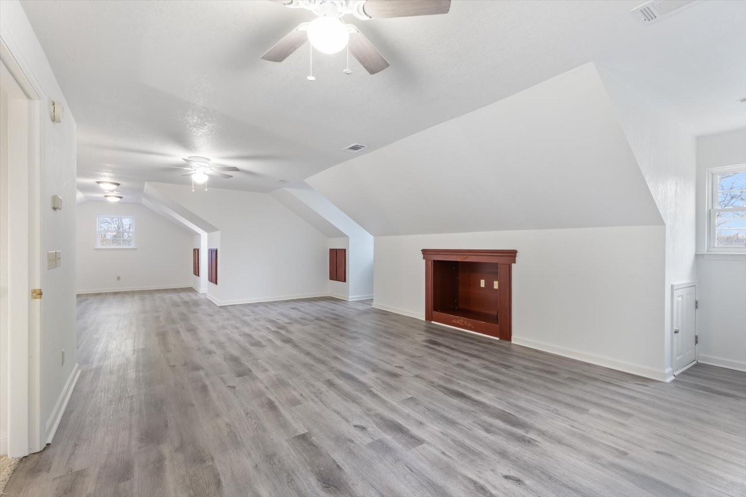 1775 Nelson Road Goodlettsville, TN 37072 - Photo 26 of 45 wooden floor in an empty room with a chandelier