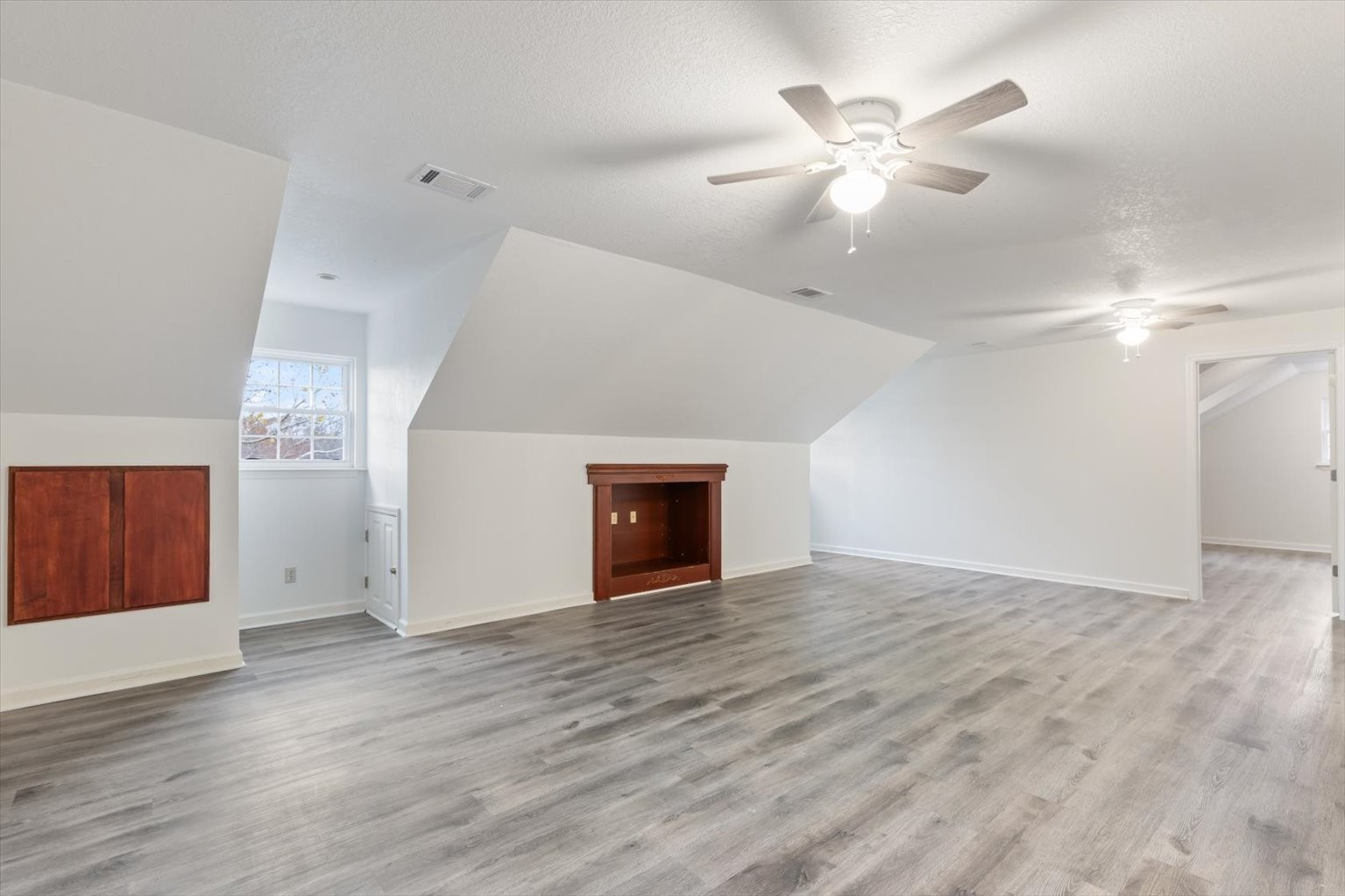 1775 Nelson Road Goodlettsville, TN 37072 - Photo 27 of 45 wooden floor in an empty room with a ceiling fan