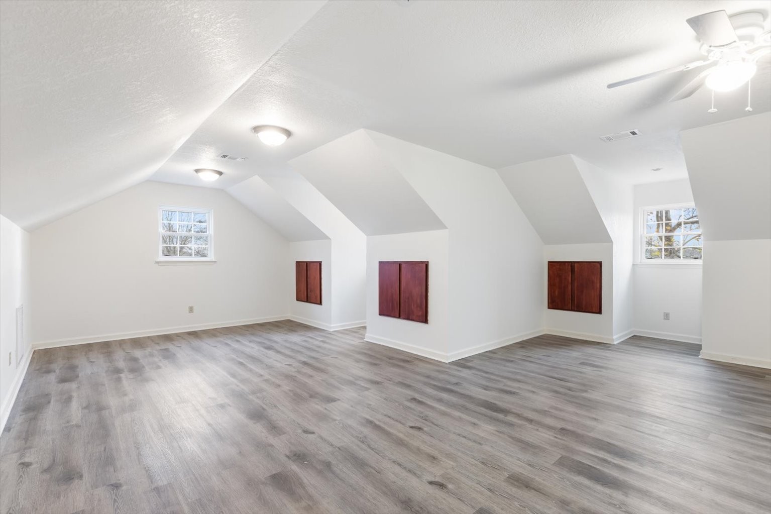 1775 Nelson Road Goodlettsville, TN 37072 - Photo 29 of 45 an empty room with wooden floor and windows