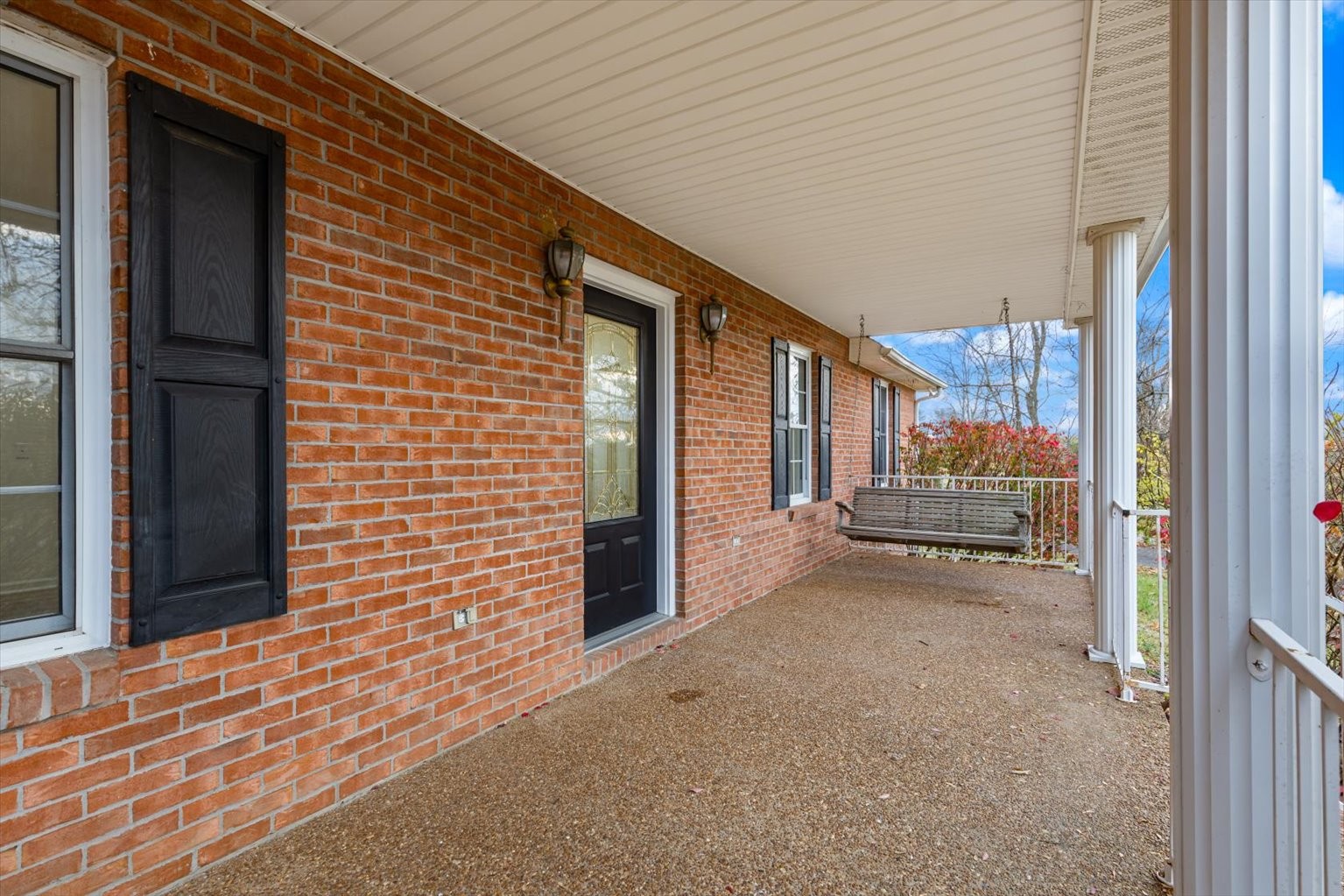 1775 Nelson Road Goodlettsville, TN 37072 - Photo 5 of 45 a view of a porch with wooden floor and stairs