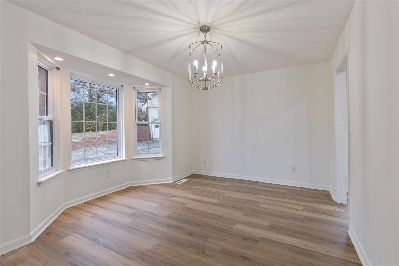 1775 Nelson Road Goodlettsville, TN 37072 - Photo 9 of 45 a view of an empty room with wooden floor and a window