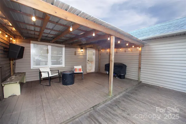 a view of a chairs and table in a room