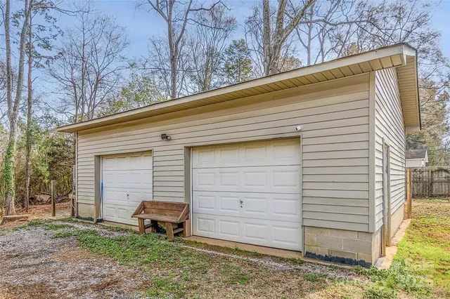 a small white house with a outdoor space