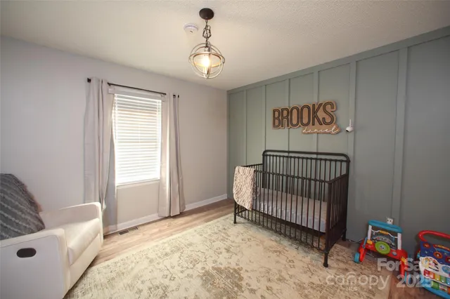 a view of a livingroom with toys and furniture