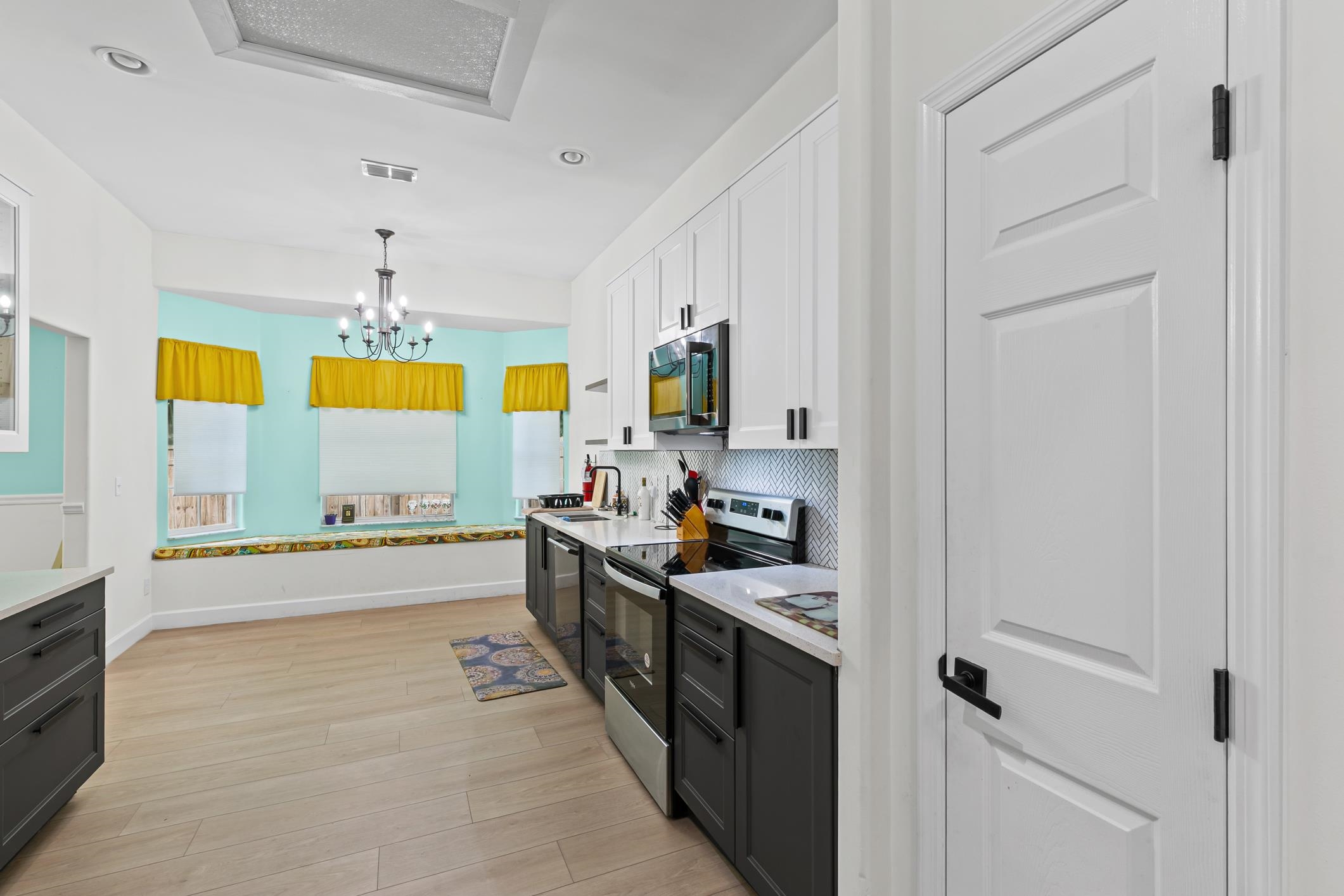11511 Mandarin Road Jacksonville, FL 32223 - Photo 12 of 41 a kitchen with stainless steel appliances granite countertop a stove a sink and a refrigerator