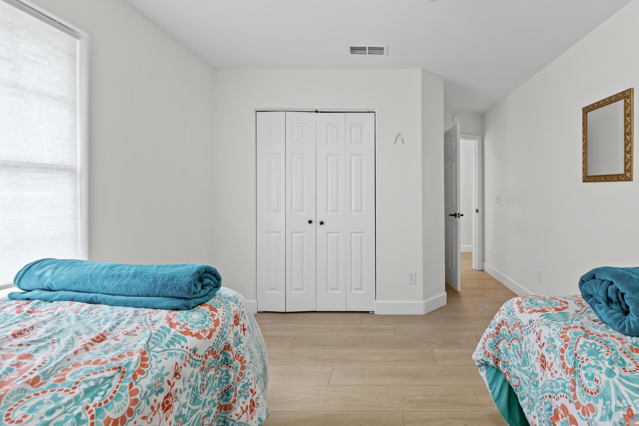 11511 Mandarin Road Jacksonville, FL 32223 - Photo 16 of 41 a bedroom with a bed and a painting on the wall