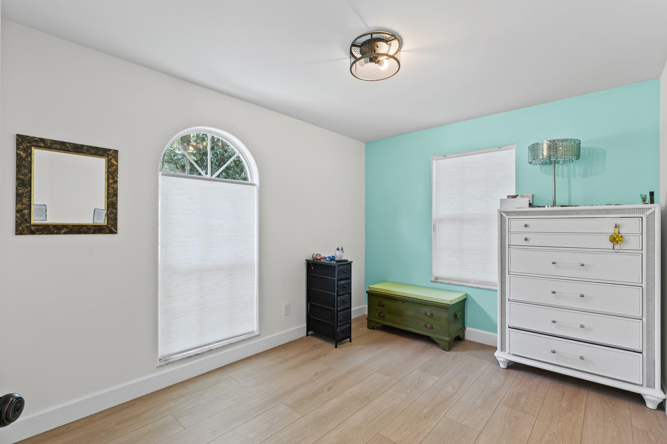 11511 Mandarin Road Jacksonville, FL 32223 - Photo 18 of 41 Bedroom with light wood-style flooring and baseboards