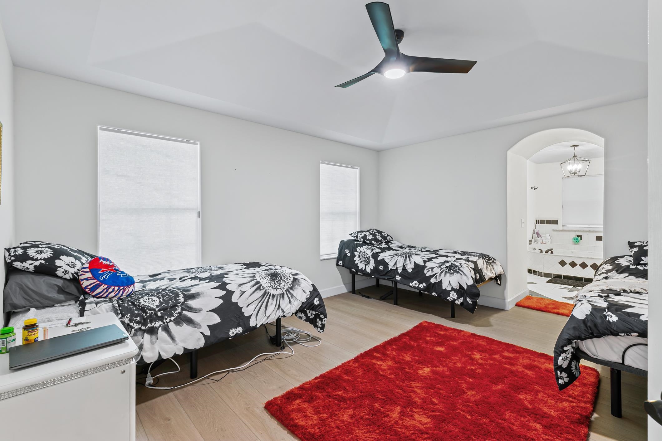 11511 Mandarin Road Jacksonville, FL 32223 - Photo 20 of 41 Bedroom with light wood-style flooring, a ceiling fan, and ensuite bath