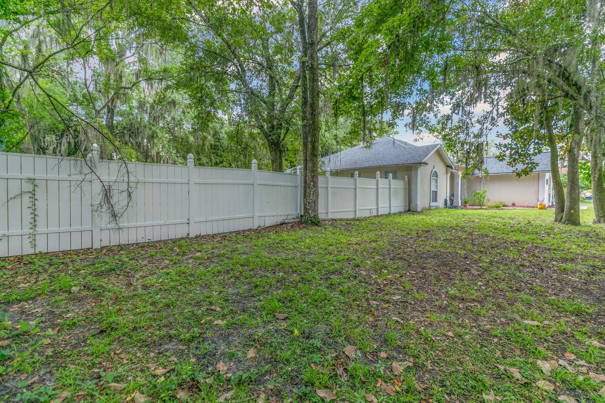 11511 Mandarin Road Jacksonville, FL 32223 - Photo 36 of 41 a view of a house with a yard