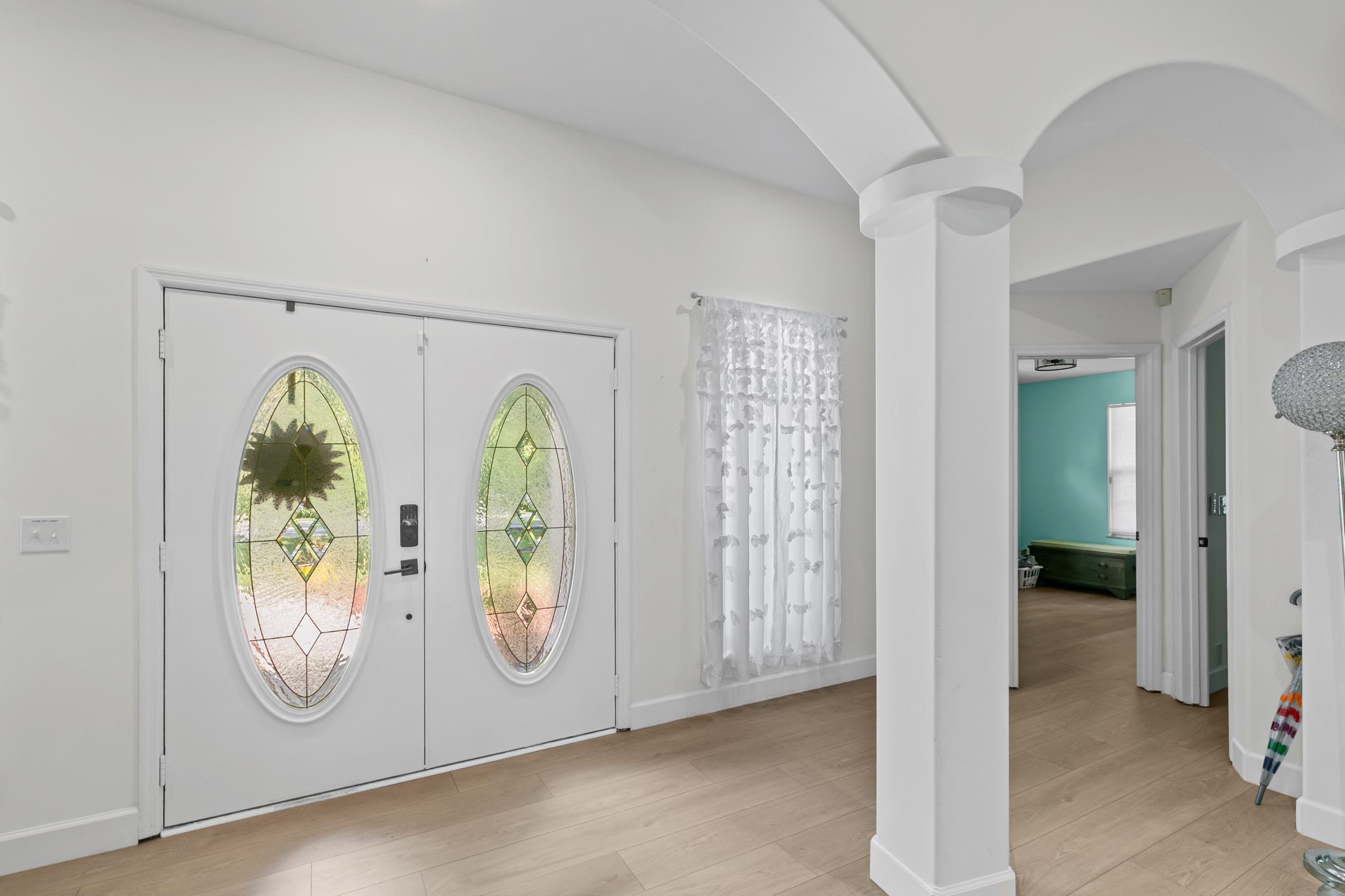 11511 Mandarin Road Jacksonville, FL 32223 - Photo 4 of 41 Entryway with french doors and light wood-style flooring