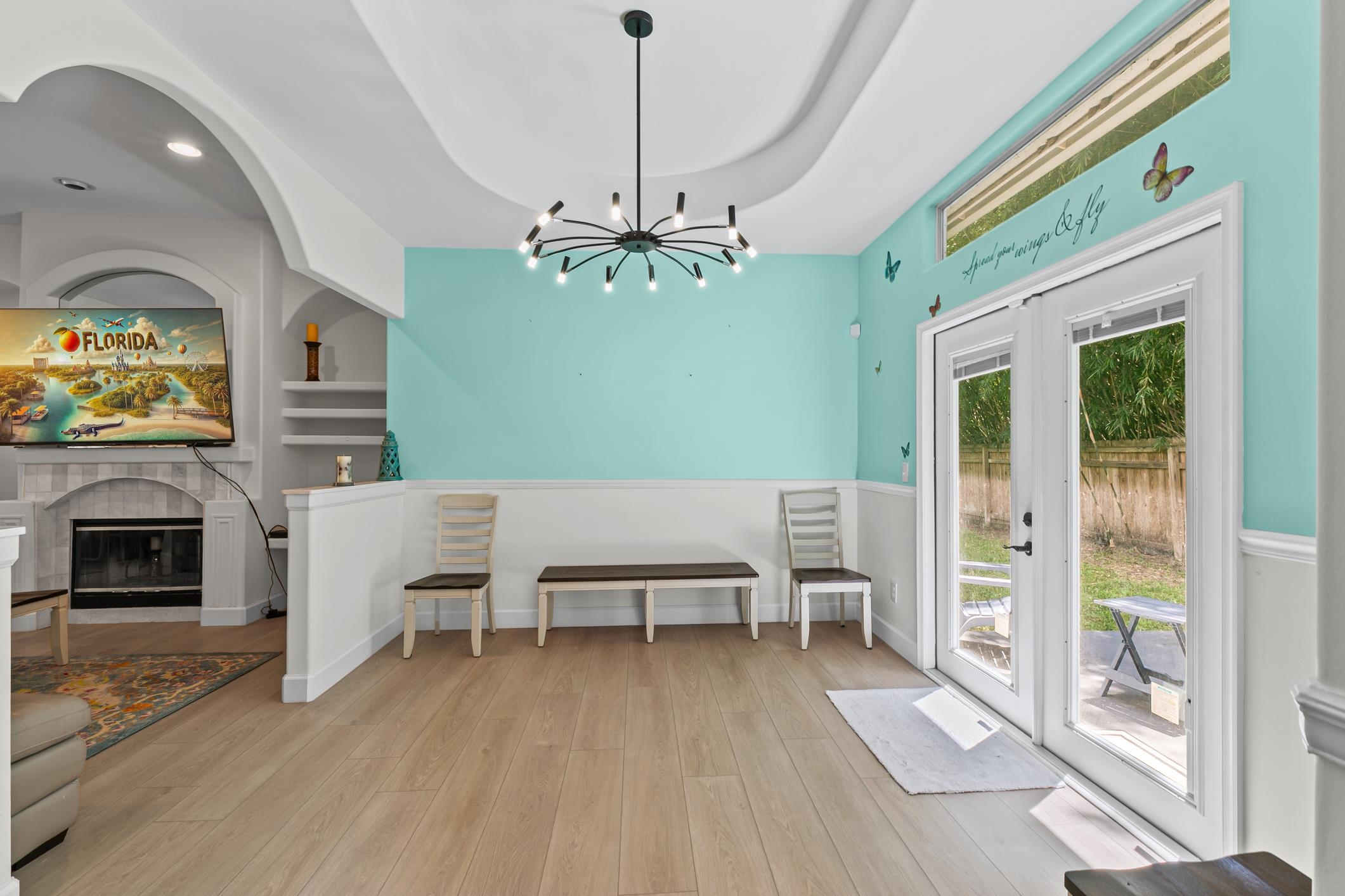 11511 Mandarin Road Jacksonville, FL 32223 - Photo 7 of 41 a view of a livingroom with furniture flat screen tv and floor to ceiling window