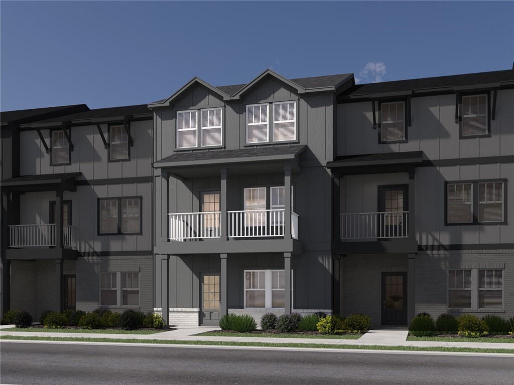 6050 Molo Lane Cumming, GA 30041 - Photo 1 of 3 a front view of residential houses