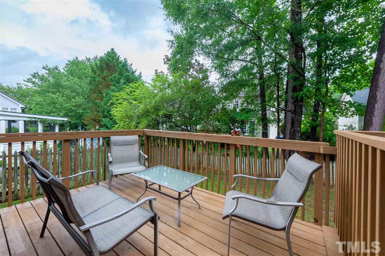 5304 Denmead Way Raleigh, NC 27613 - Photo 18 of 19 a view of a two chairs in the deck