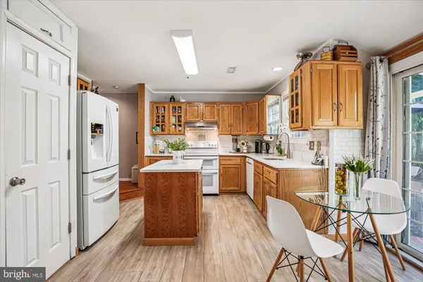 a view of a hallway with a window