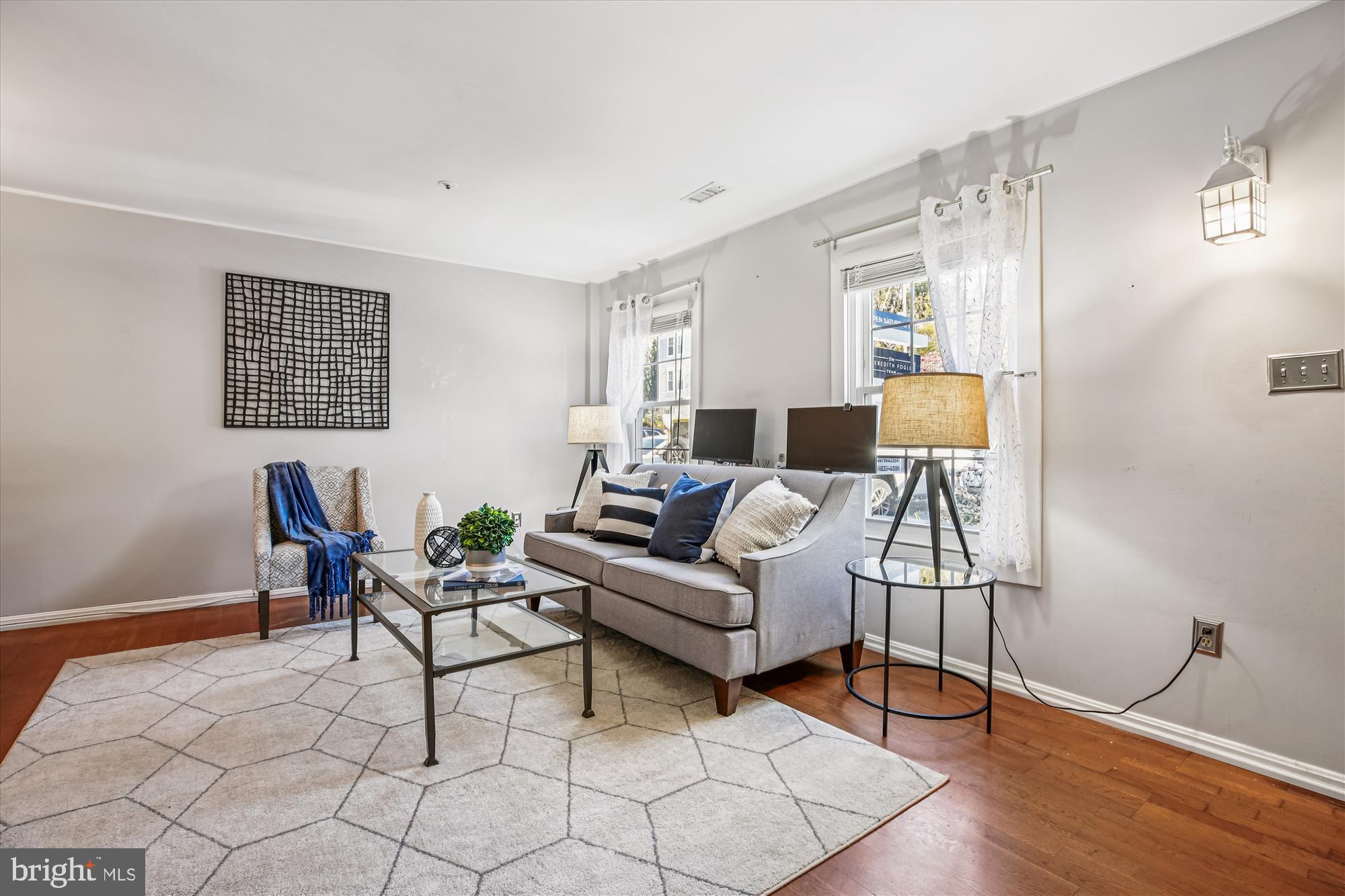 30 Spring Street Gaithersburg, MD 20877 - Photo 9 of 41 Light Filled Living Room Area with Large Windows