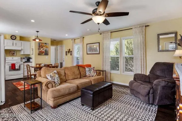 a living room with furniture or couch and a window