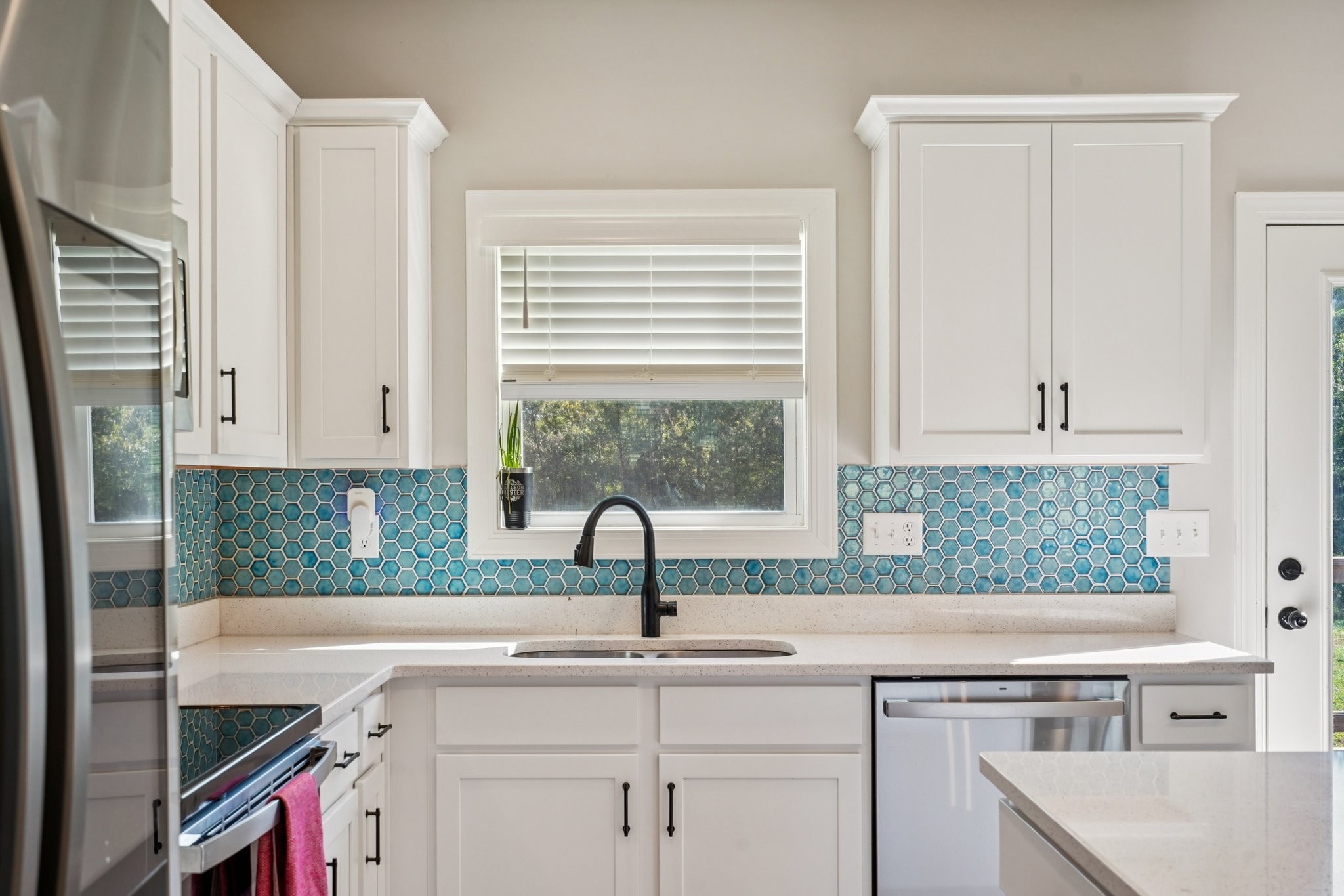 258 Woodruff Road Adams, TN 37010 - Photo 15 of 49 a kitchen with a sink and large window