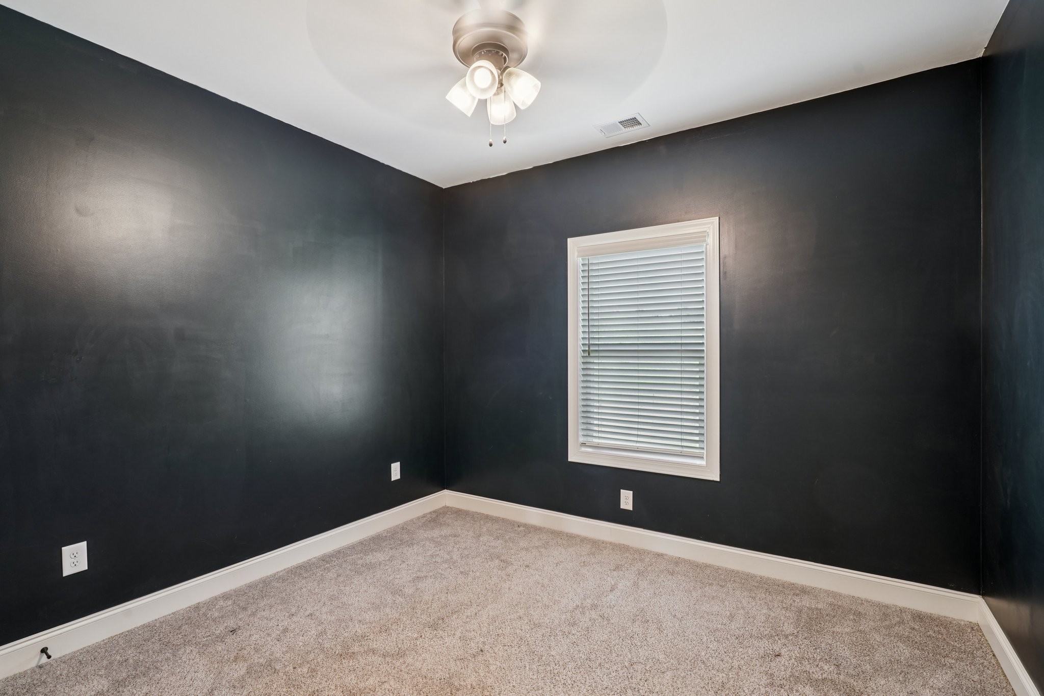 258 Woodruff Road Adams, TN 37010 - Photo 18 of 49 a view of an empty room with a window