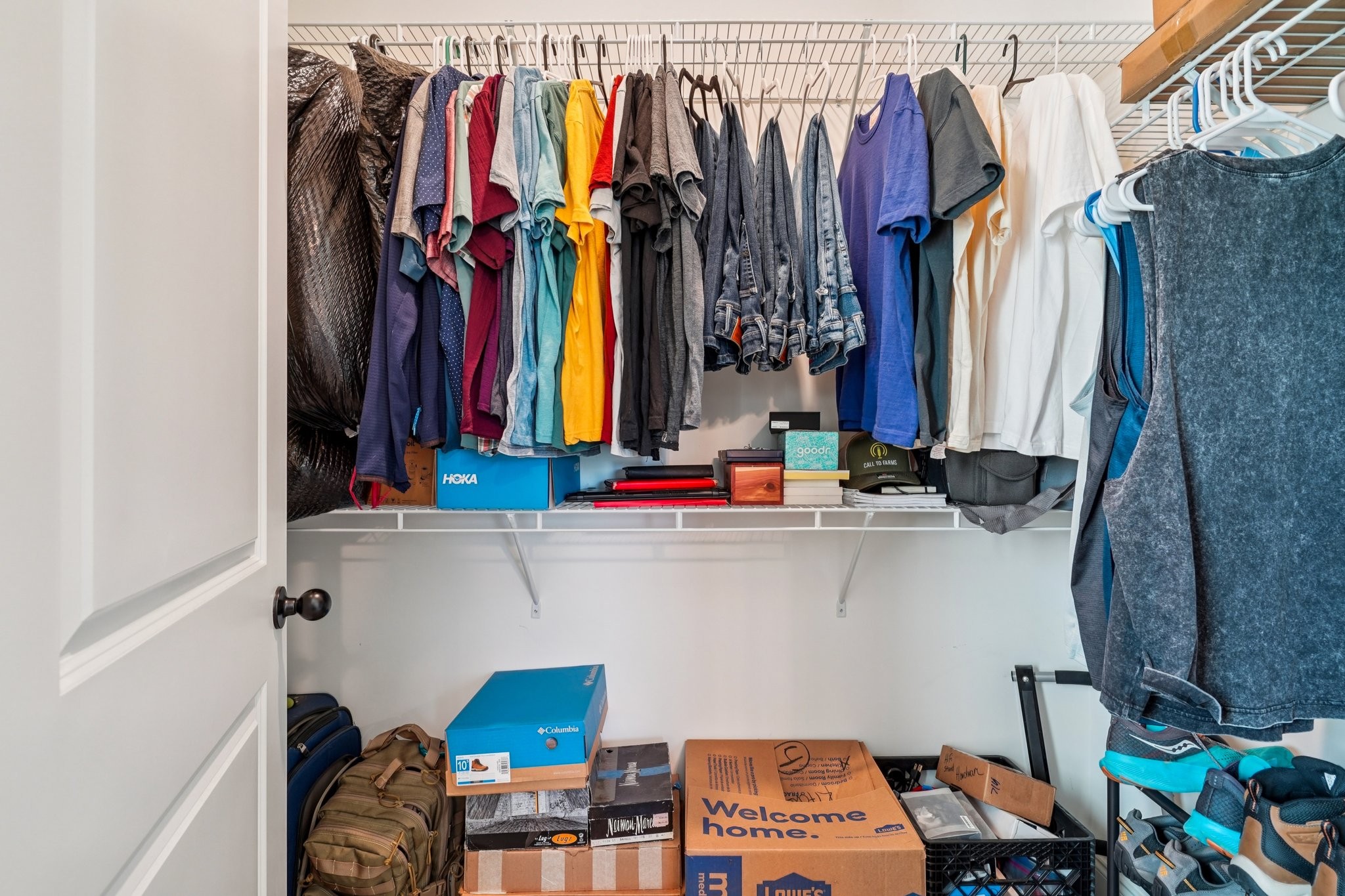 258 Woodruff Road Adams, TN 37010 - Photo 24 of 49 a view of walk in closet with clothes and shoes