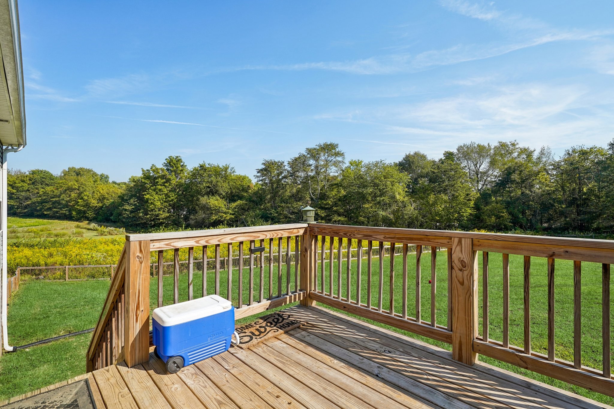258 Woodruff Road Adams, TN 37010 - Photo 30 of 49 a view of balcony with wooden floor and outdoor space