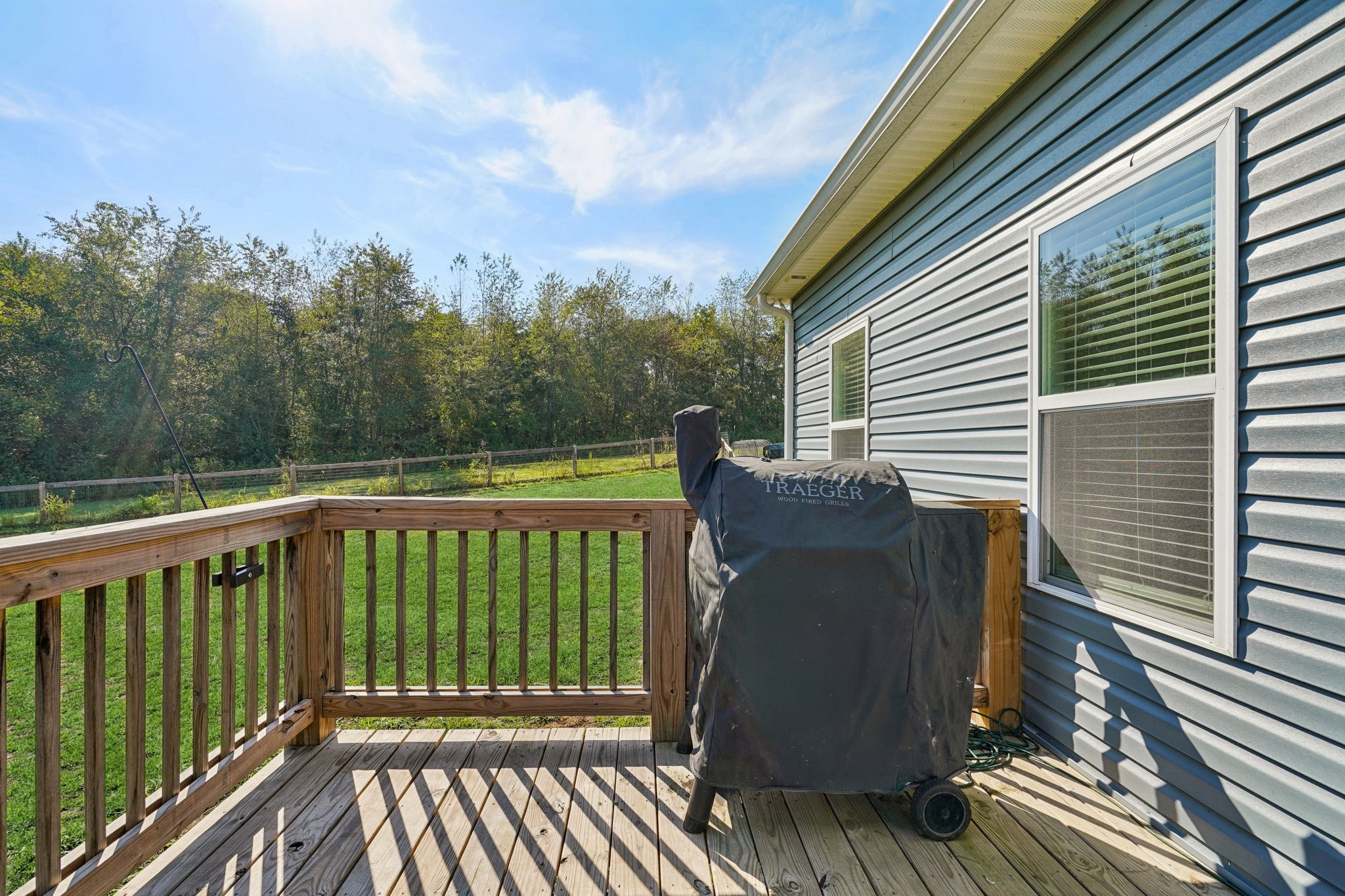 258 Woodruff Road Adams, TN 37010 - Photo 31 of 49 a view of a two chairs in the balcony