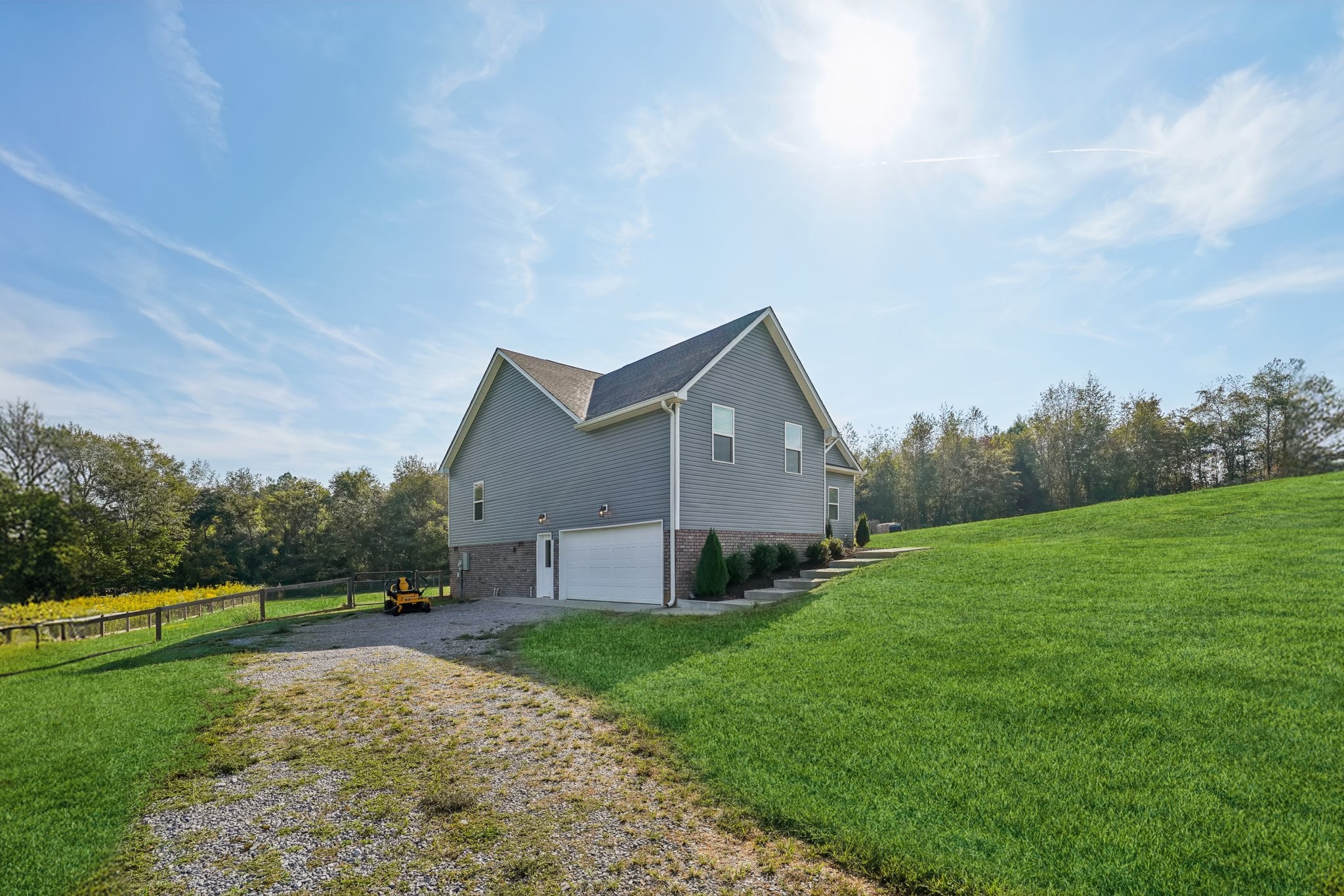 258 Woodruff Road Adams, TN 37010 - Photo 34 of 49 a view of a house with backyard