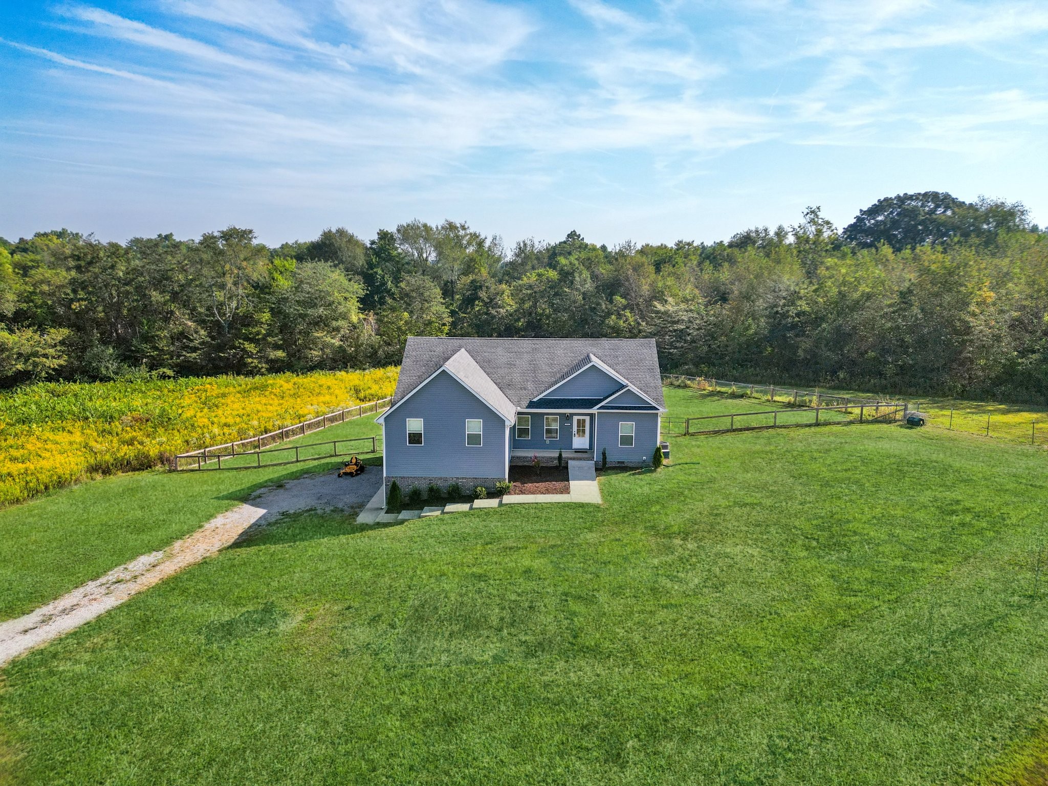 258 Woodruff Road Adams, TN 37010 - Photo 36 of 49 a view of a house with a big yard