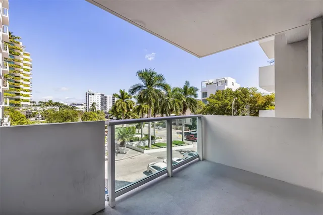 a view of a balcony with an outdoor space