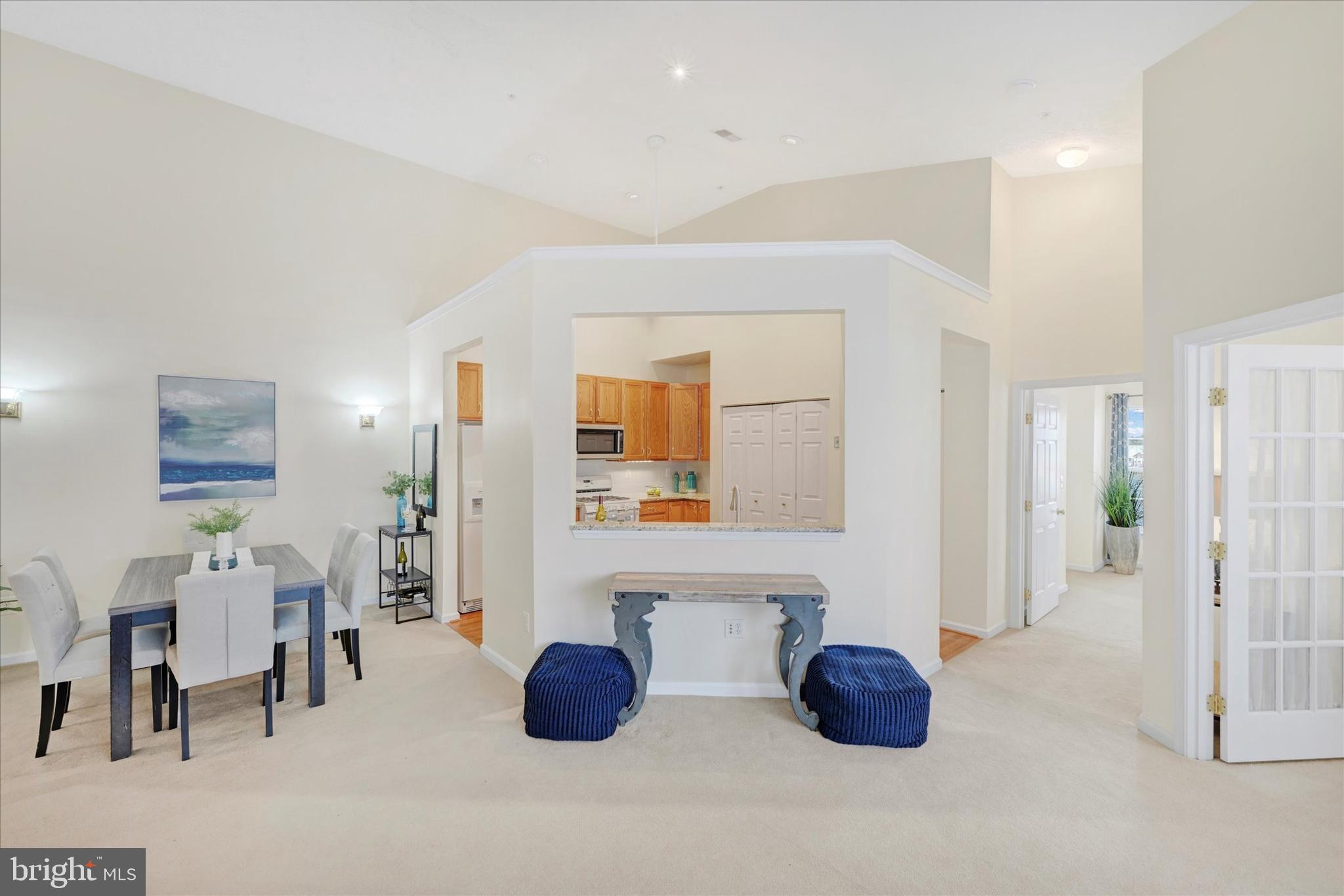 9606 Haven Farm Road, Unit 9606M Perry Hall, MD 21128 - Photo 12 of 49 a living room with furniture and a table