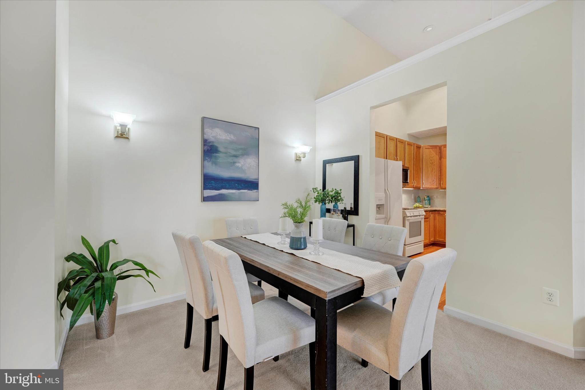 9606 Haven Farm Road, Unit 9606M Perry Hall, MD 21128 - Photo 7 of 49 a view of a dining room with furniture and wooden floor