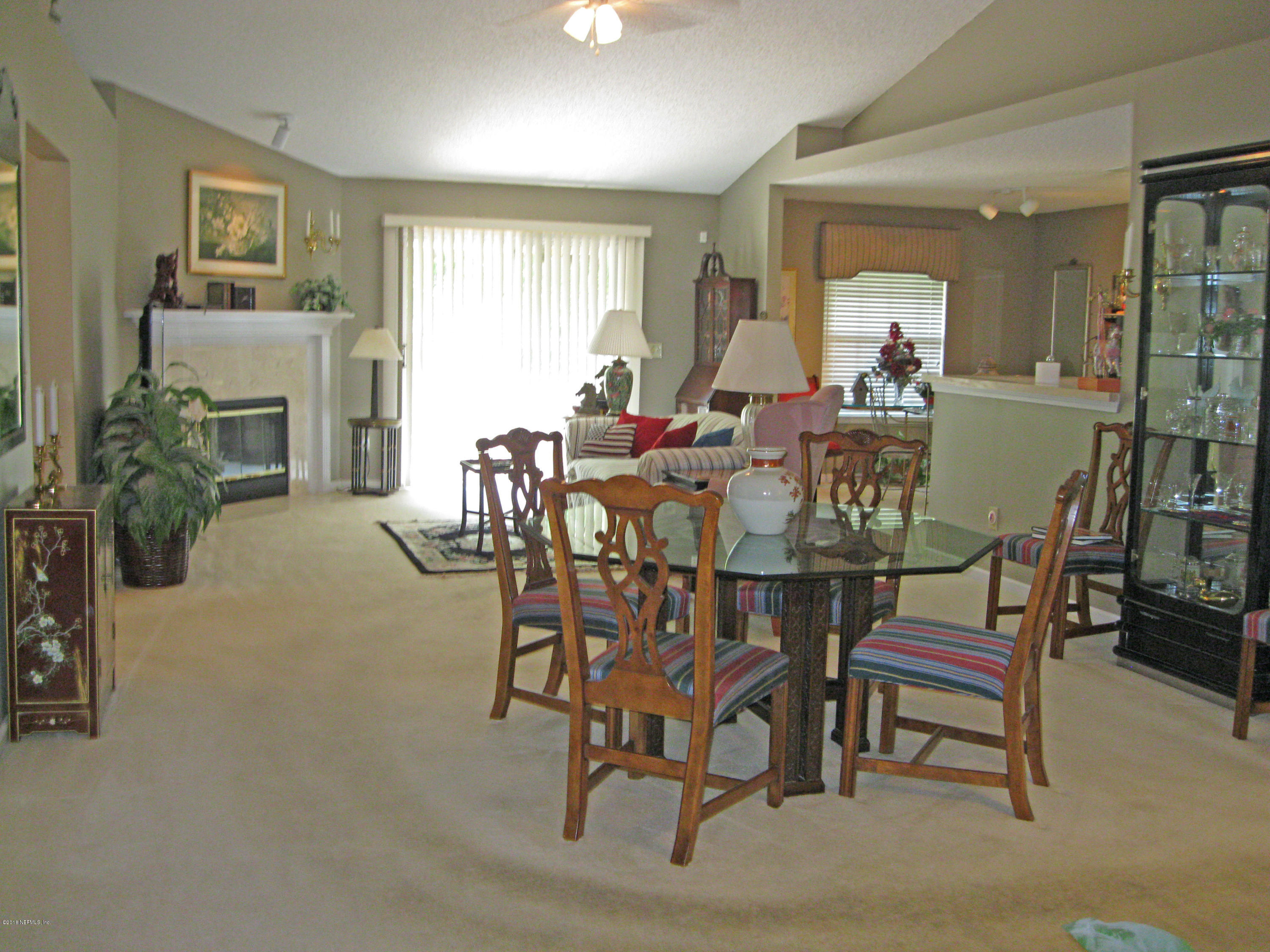 11976 Swooping Willow Road Jacksonville, FL 32223 - Photo 5 of 20 DINING TO FAMILY ROOM