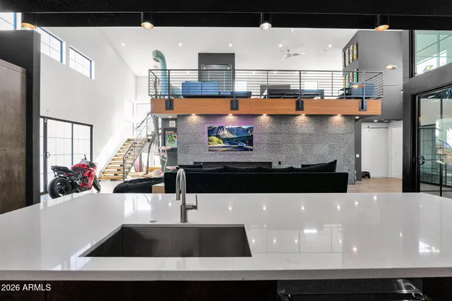 a view of a living room and dining room