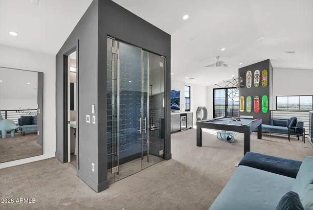 a living room with furniture and a table