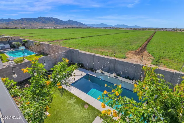 an aerial view of a house with a garden