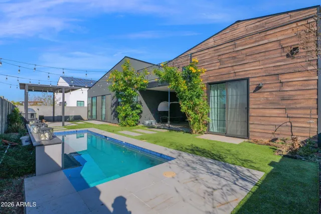 a view of a house with swimming pool