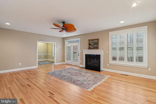 a bathroom with a sink and a mirror with toilet