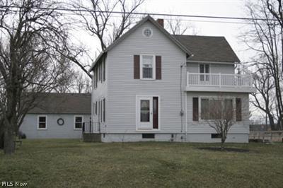 750 Hallock Young Road Mineral Ridge, OH 44440 - Photo 1 of 1 Front view from front yard. Balcony is off the master bedroom.