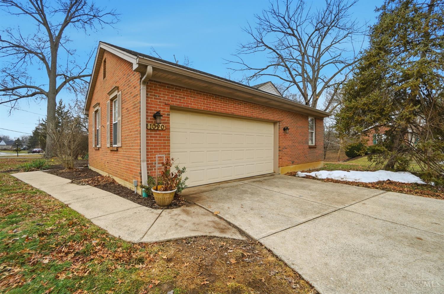1090 West Galbraith Road Cincinnati, OH 45231 - Photo 32 of 37 Two car side entry garage and driveway.