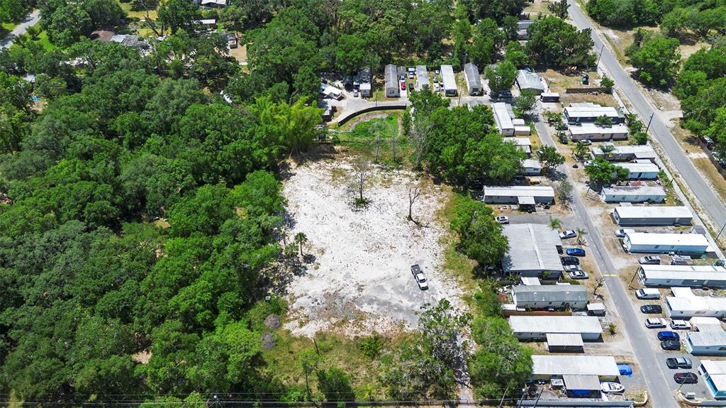 17520 Evans Trail Orlando, FL 32833 - Photo 5 of 11 an aerial view of residential houses with outdoor space