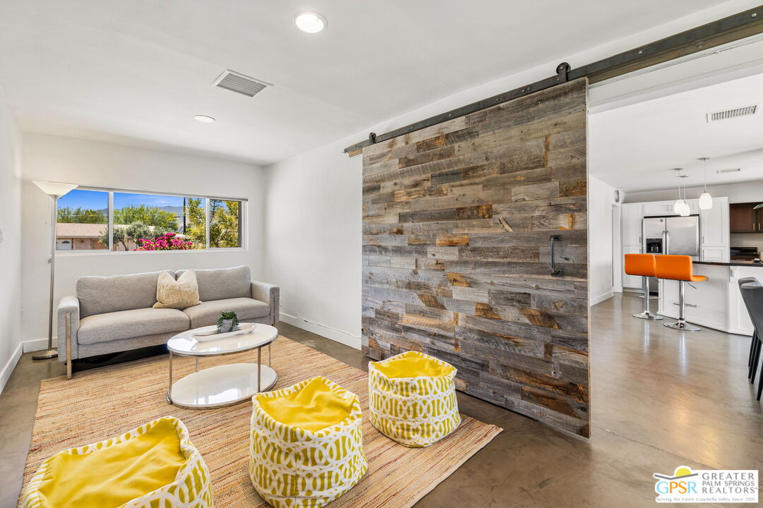 490 East Molino Road Palm Springs, CA 92262 - Photo 28 of 47 a living room with furniture and a table