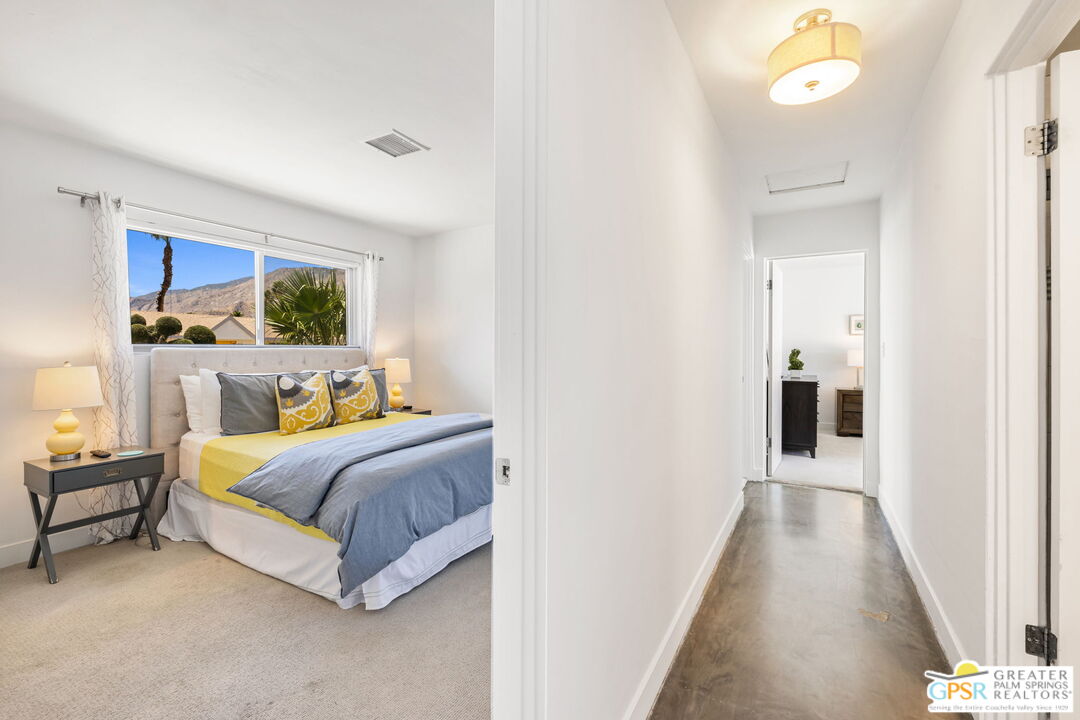 490 East Molino Road Palm Springs, CA 92262 - Photo 30 of 47 a bedroom with a bed and a window
