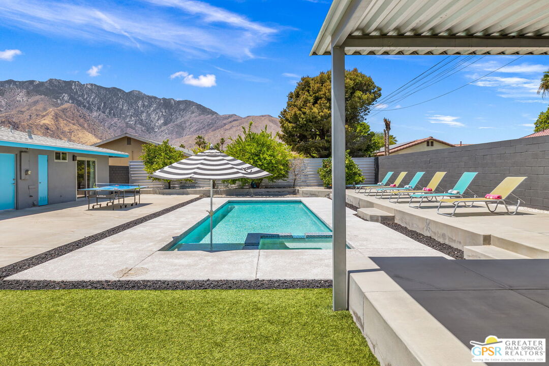 490 East Molino Road Palm Springs, CA 92262 - Photo 3 of 47 a view of an chairs and tables in the patio
