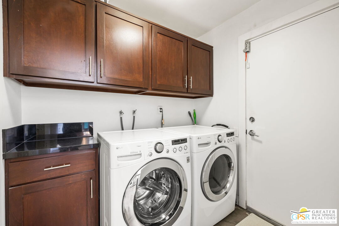 490 East Molino Road Palm Springs, CA 92262 - Photo 36 of 47 a utility room with dryer and washer