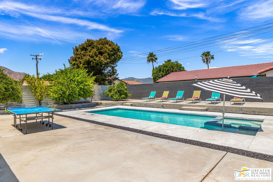 490 East Molino Road Palm Springs, CA 92262 - Photo 38 of 47 a view of swimming pool with a yard