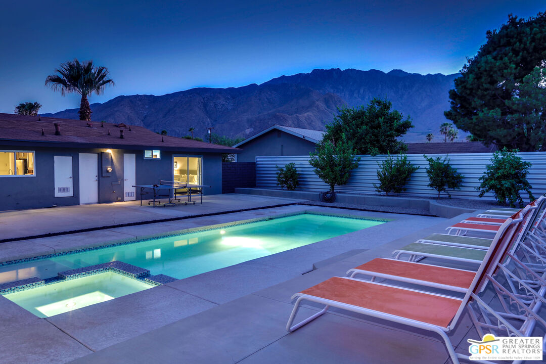 490 East Molino Road Palm Springs, CA 92262 - Photo 4 of 47 a swimming pool with outdoor seating and yard