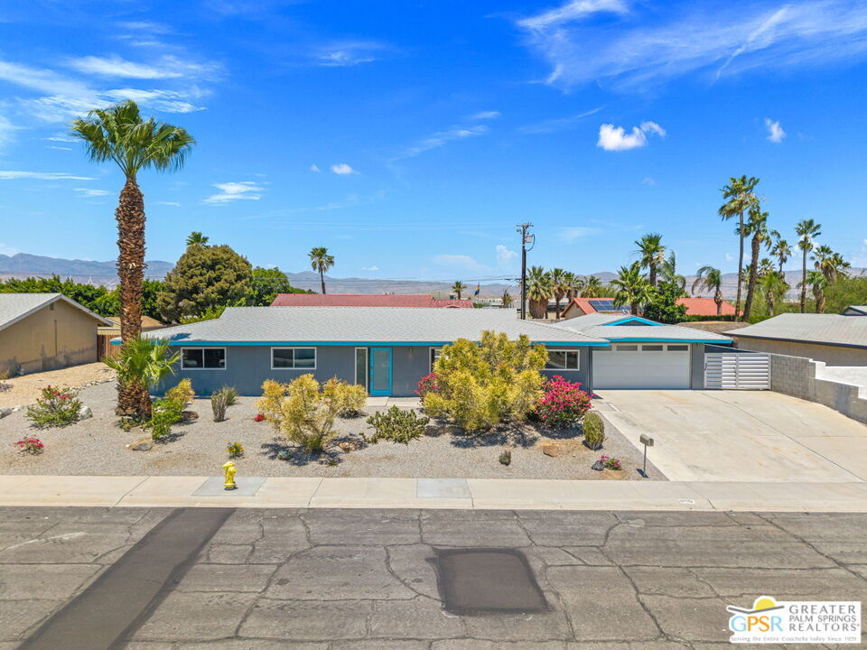 490 East Molino Road Palm Springs, CA 92262 - Photo 43 of 47 a view of a house with flower plants