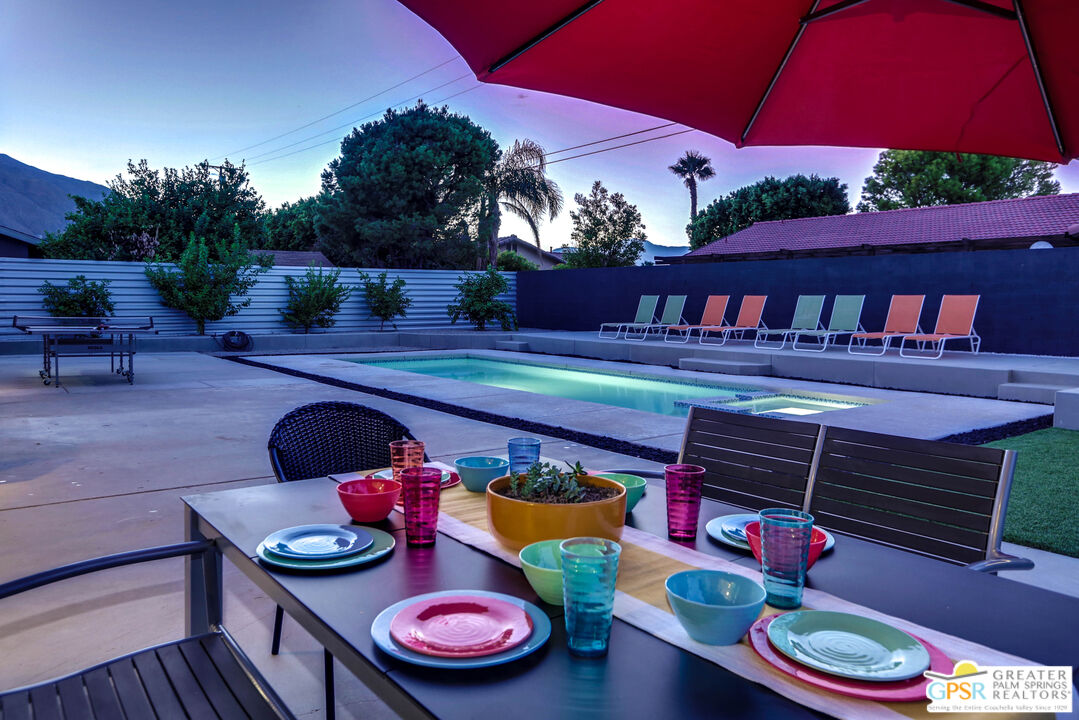 490 East Molino Road Palm Springs, CA 92262 - Photo 6 of 47 a view of a table and chairs in patio