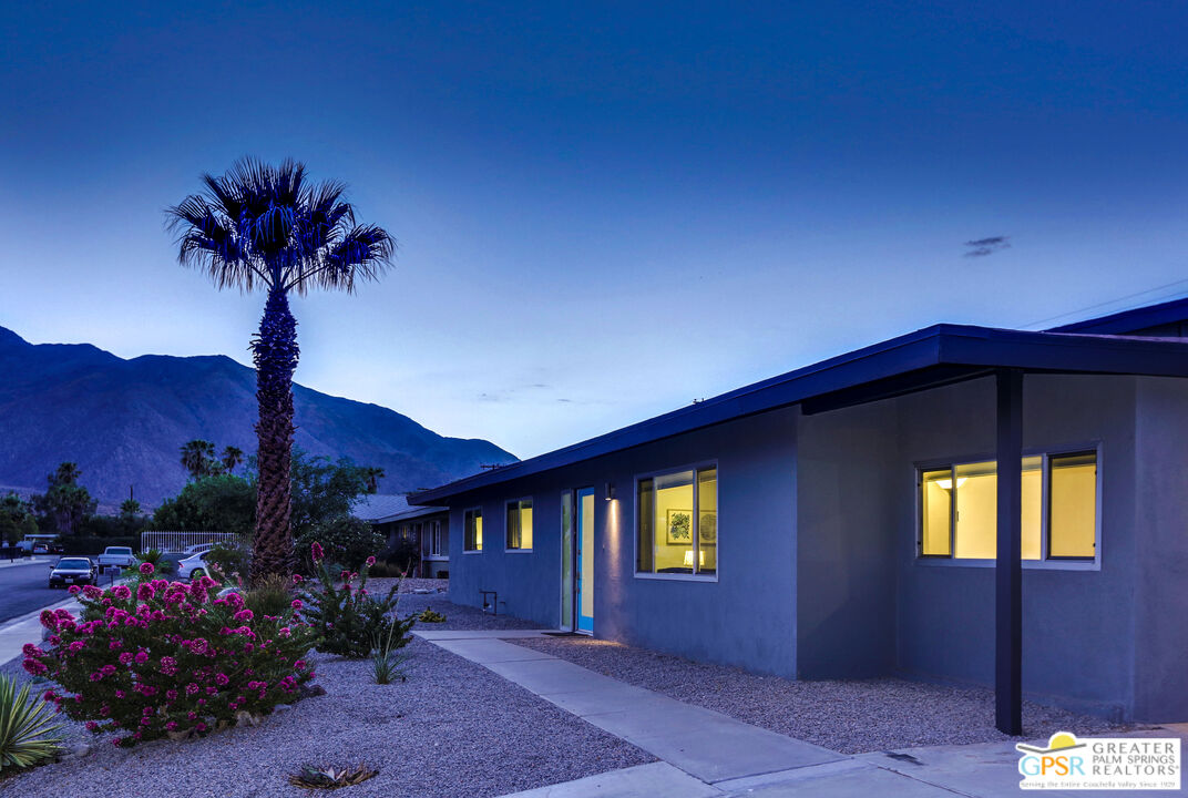 490 East Molino Road Palm Springs, CA 92262 - Photo 9 of 47 a front view of a house with a yard
