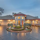a room with lots of furniture and a fountain